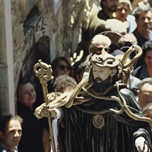 Statue carried in a parade during the Festival of Snakes in Abruzzo