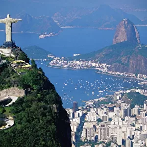 Statue of Christ the Redeemer overlooking city and Sugar Loaf mountain