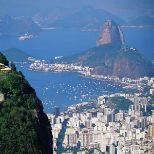 Statue of Christ the Redeemer overlooking city and Sugar Loaf mountain