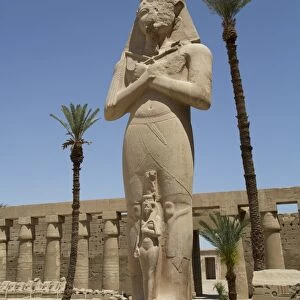 Statue of Ramses II with his daughter Benta-Anta, Forecourt, Karnak Temple, Luxor