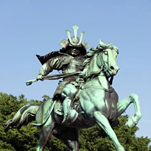 Statue of Samurai warrior Masashige Kusunoki on horseback in Hibiya Park in downtown Tokyo
