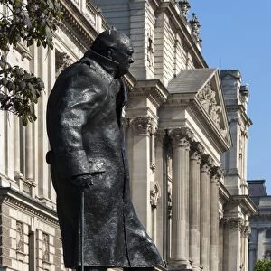 Statue of Sir Winston Churchill, Parliament Square, Parliamentary Buildings in background, London, England, United Kingdom, Europe