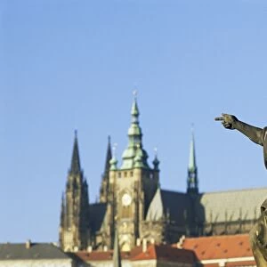 Statue of St. John the Baptist, dating from 1857, on Charles Bridge, pointing to Gothic St