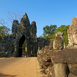 Statues of giants holding the sacred naga, South Entry Gate, Angkor Thom