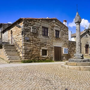 Stone pillory and Main Church, Idanha-a-Velha village, Serra da Estrela, Beira Alta, Portugal, Europe
