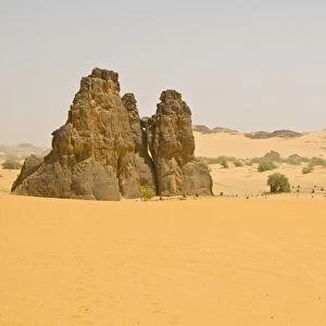 Strange rock formation La Vache Qui Pleure (the cow that cries), near Djanet, Algeria, North Africa