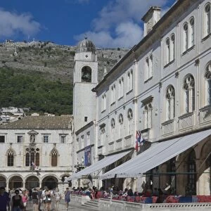 Street with cafes, foot worn polished pavement and the Clock Tower, Old City, Dubrovnik, UNESCO World Heritage Site, Croatia, Europe