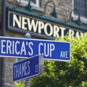 Street sign reflecting Newports sailing and historic heritage at the junction of Americas Cup Avenue and Thames Street in Newport, Rhode Island, New England, United States of America