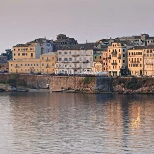 Summer sunrise on the waterfront, Old Town from the sea, Corfu Town, UNESCO World Heritage Site, Corfu, Ionian Islands, Greek Islands, Greece, Europe