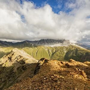 Sun and clouds on the rocky crest of the Alps, Filon del Mott, Bormio, Braulio Valley