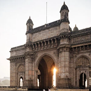 Sunrise behind The Gateway to India, Mumbai (Bombay), India, South Asia