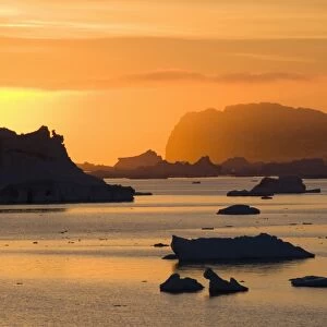 Sunrise on ice in the Antarctic Sound, Antarctic Peninsula, Antarctica, Polar Regions