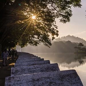 Sunrise at Kandy Lake and the island which houses the Royal Summer House, Kandy, UNESCO World Heritage Site, Central Province, Sri Lanka, Asia