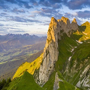 Sunrise on rocky peak of Saxer Lucke mountain in summer, Appenzell Canton, Alpstein Range