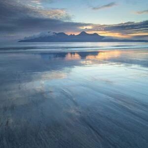Sunset over the Isle of Rhum, from Bay of Laig, Scotland, United Kingdom, Europe