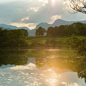 Sunset at Loughrigg Tarn near Ambleside in The Lake District National Park, Cumbria