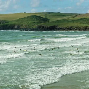 Surfers at Polzeath, Hayle Bay and the Cornish coast, Cornwall, England