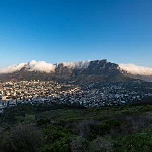 Table Mountain covered in a tablecloth of orographic clouds, Cape Town, South Africa