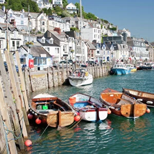 Tenders moored on the quayside in Looe, Cornwall, England, United Kingdom, Europe
