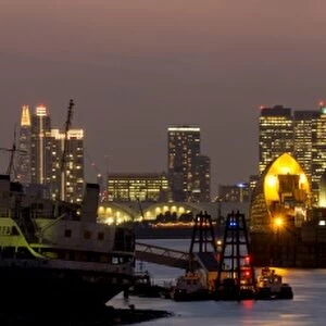 Thames Flood Barrier with Docklands and Canary Wharf panorama from Woolwich, London