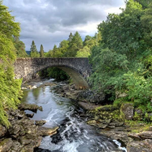 The Thomas Telford Bridge and the Invermoriston falls and river on the shores of Loch Ness, Scotland, United Kingdom, Europe