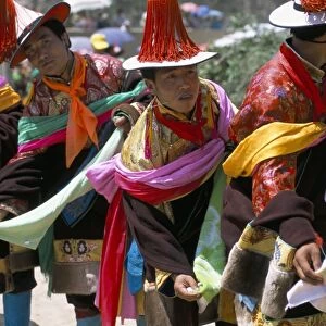 Tibetans dressed for religious shamans ceremony, Tongren, Qinghai Province