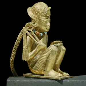 Tiny solid gold statuette of Amenophis III found in a small mummiform coffin in the tomb of the pharaoh Tutankhamun, discovered in the Valley of the Kings, Thebes, Egypt, North