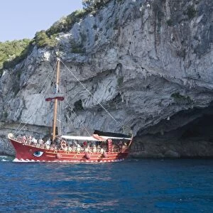 Tourist boat at Papanikolis Cave, Meganisi, Ionian Islands, Greek Islands, Greece, Europe