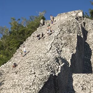 Tourists climbing Nohoch Mul (big mound), Coba, Quintana Roo, Mexico, North America