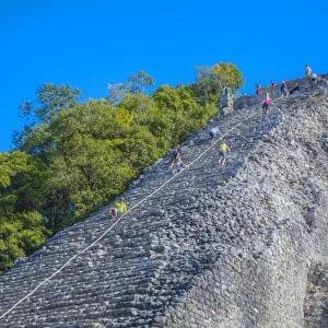 Tourists climbing the temple, Nohoch Mul Temple, Coba, Quintana Roo, Mexico, North
