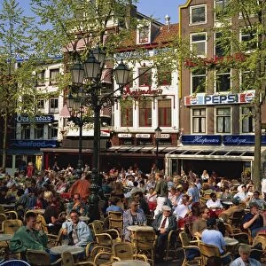 Tourists and locals at an open air cafe in Leidseplein