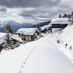Tourists and skiers enjoying the snowy landscape, Bettmeralp, district of Raron, canton of Valais