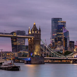 Tower Bridge and The City of London at sunset, London, England, United Kingdom, Europe