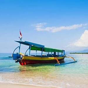 Traditional colourful Indonesian boat on the tropical island of Gili Meno, Gili Islands, Indonesia, Southeast Asia, Asia