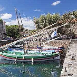 Traditional fishing boats at the port, Chateau Royal Fortress, Collioure, Pyrenees-Orientales