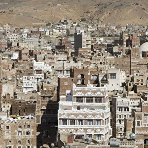 Traditional ornamented brick architecture on tall houses, Old City, within Sana a