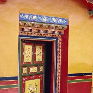 Traditional painted door in the summer palace of the Dalai Lama, Norbulingka