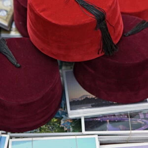 Traditional Turkish fezes and postcards for sale, Istanbul, Turkey, Europe