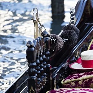 Detail of traditional Venetian Gondola showing Gondoliers straw hat, Venice, Veneto