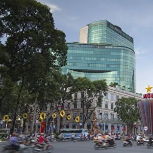 Traffic passing Diamond Plaza, Ho Chi Minh City, Vietnam, Indochina, Southeast Asia, Asia