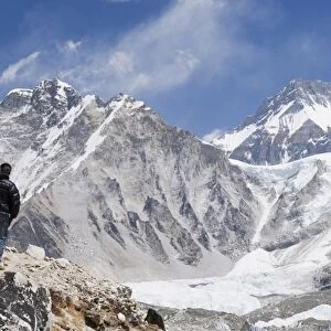 Trekkers looking at the Western Cwm glacier, Solu Khumbu Everest Region