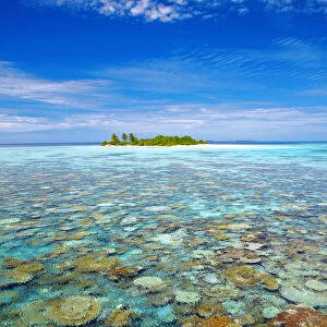 Tropical island surrounded by coral reef, The Maldives, Indian Ocean, Asia