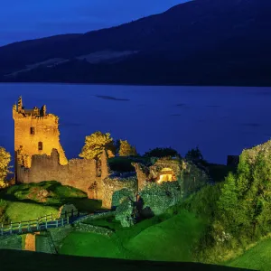 Twilight view of Urquhart Castle and Loch Ness, Highlands, Scotland, United Kingdom