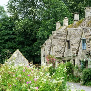 Typical Cotswold houses in the village of Bibury, The Cotswolds, Gloucestershire