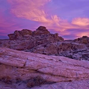 Vibrant orange clouds over red and white sandstone at sunset, Gold Butte, Nevada, United States of America, North America