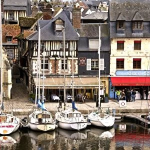 The Vieux Bassin, Old Town, the Naval Museum housed in ancient Saint Etienne church on the left, and boats moored along the quay, Honfleur, Calvados, Normandy, France, Europe