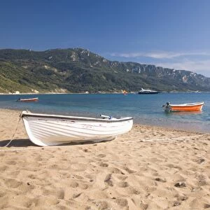 View from the beach to distant Cape Taxiarhis, Agios Georgios, Corfu, Ionian Islands, Greek Islands, Greece, Europe