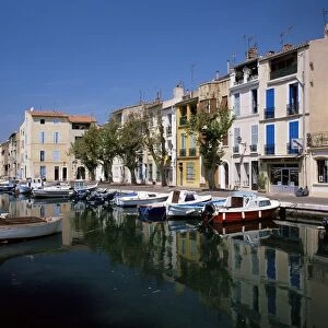 View across canal to colourful houses, Martigues, Bouches-du-Rhone, Provence