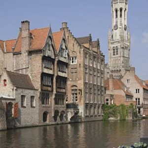 View over a canal of traditional Flemish gables and the Belfry, Brugge, UNESCO World Heritage Site, Belgium, Europe