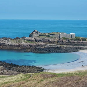 View over Chateau A L Etoc (Chateau Le Toc) and Saye Beach, Alderney, Channel Islands